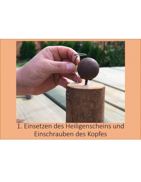 1. Einsetzen Heiligenschein und Einschrauben des Kopfes