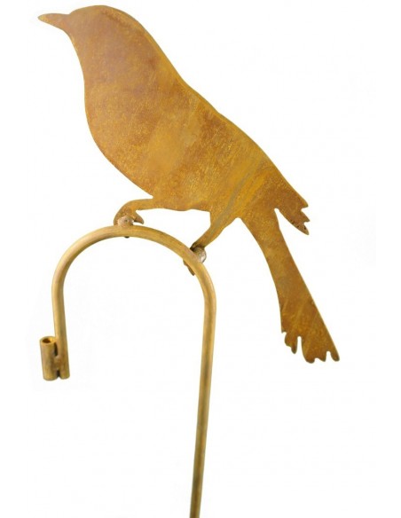 Deko rostiges Zaunelement mit Elster