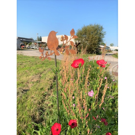 Vogel auf einem Stab sitzend als Gartenstecker und Goldpunkten