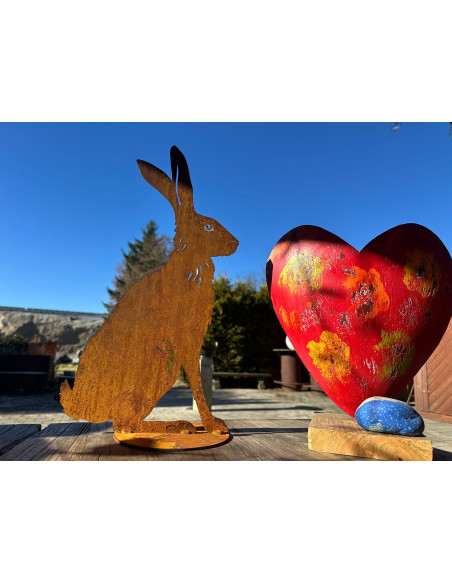 Hasen sitzender Feldhase XL mit Ausschnitten - 48 cm hoch - Edelrost Osterhase 
Höhe 48 cm
Breite 27 cm
mit einer Standplatte